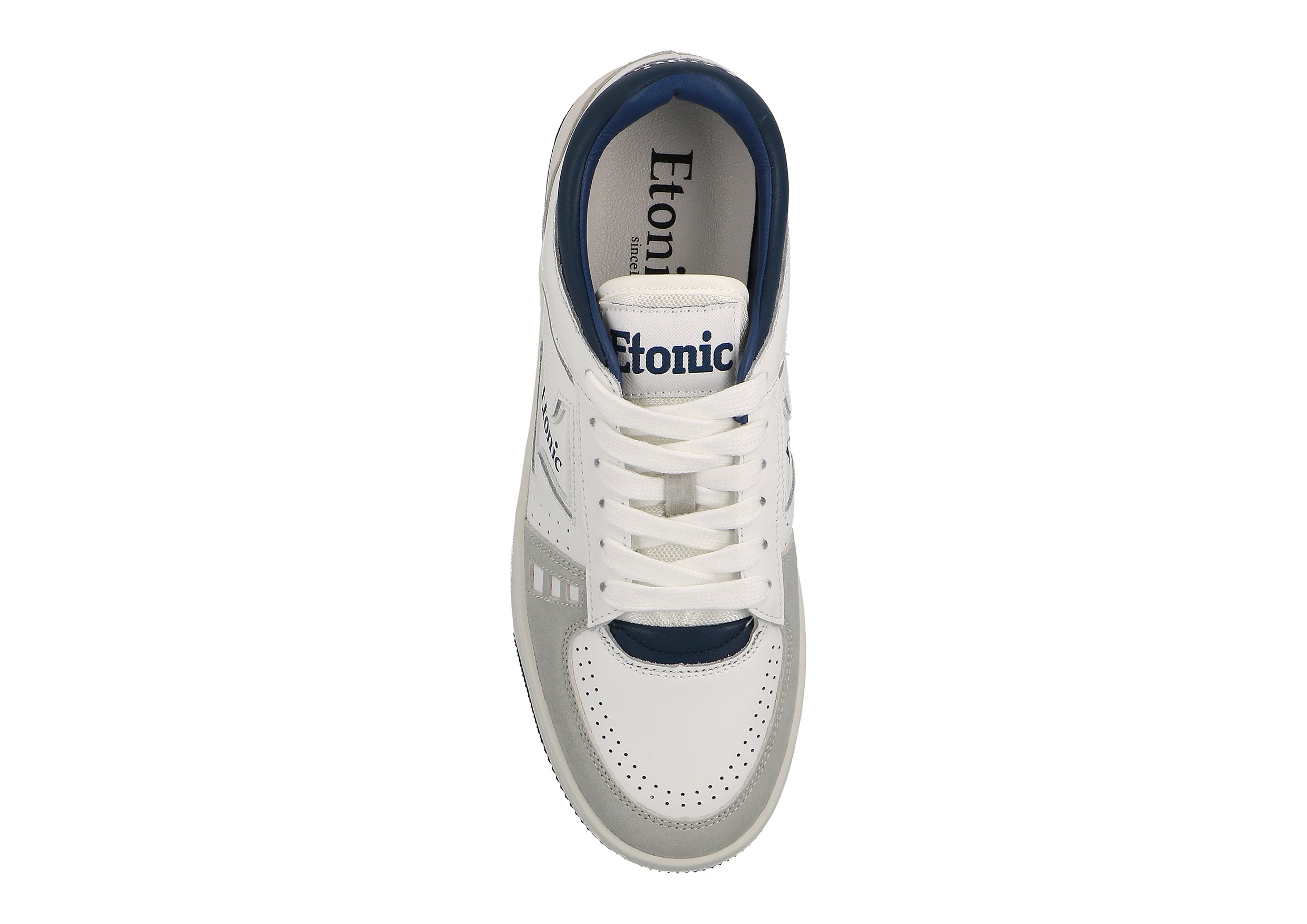 Sneakers Etonic B509 in pelle bianca, camoscio grigio chiaro, dettagli blu navy e suola bianco sporco.