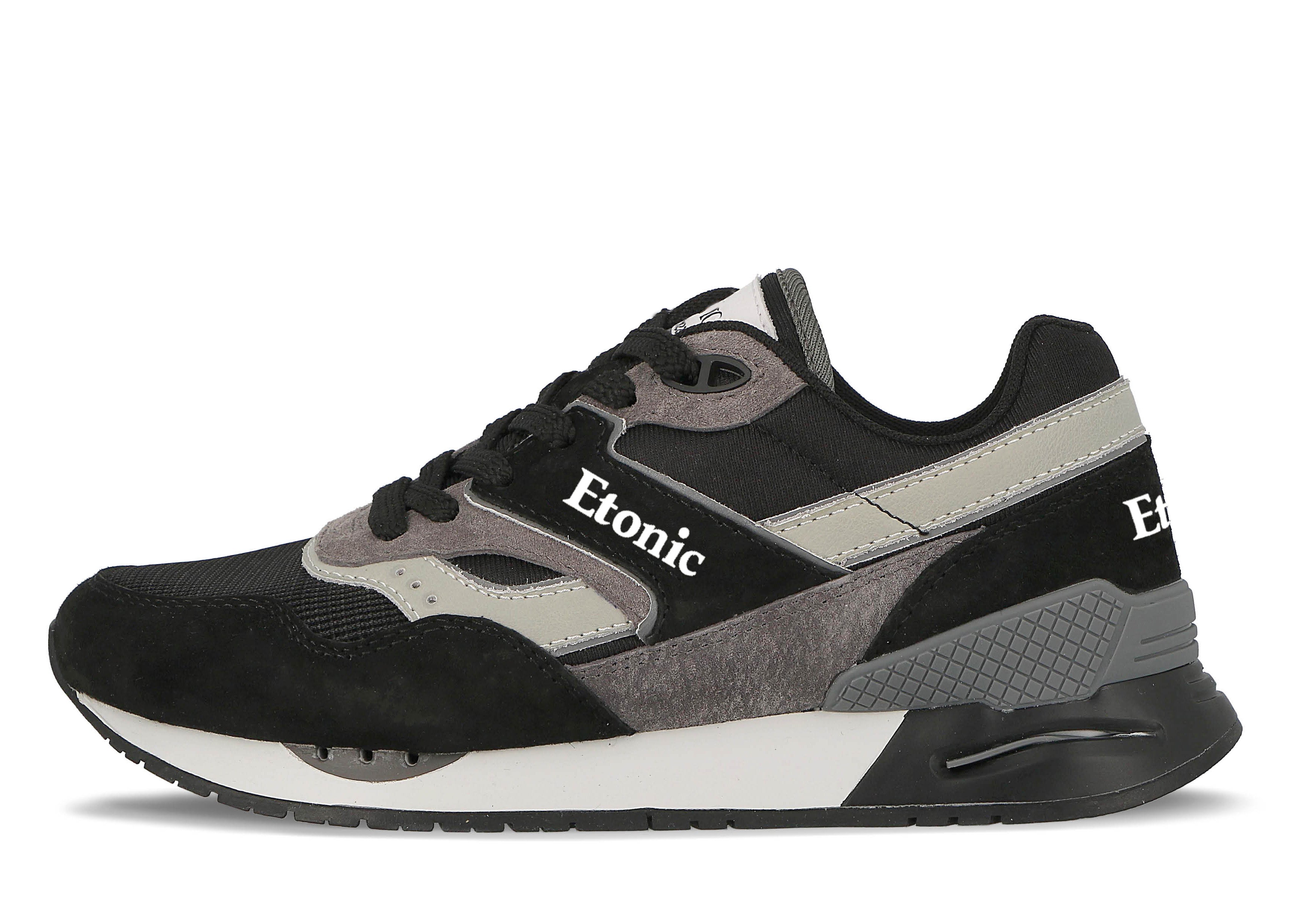 Sneakers Stable Base di Etonic in mesh e suede nero con inserti multi-strato in pelle grigia