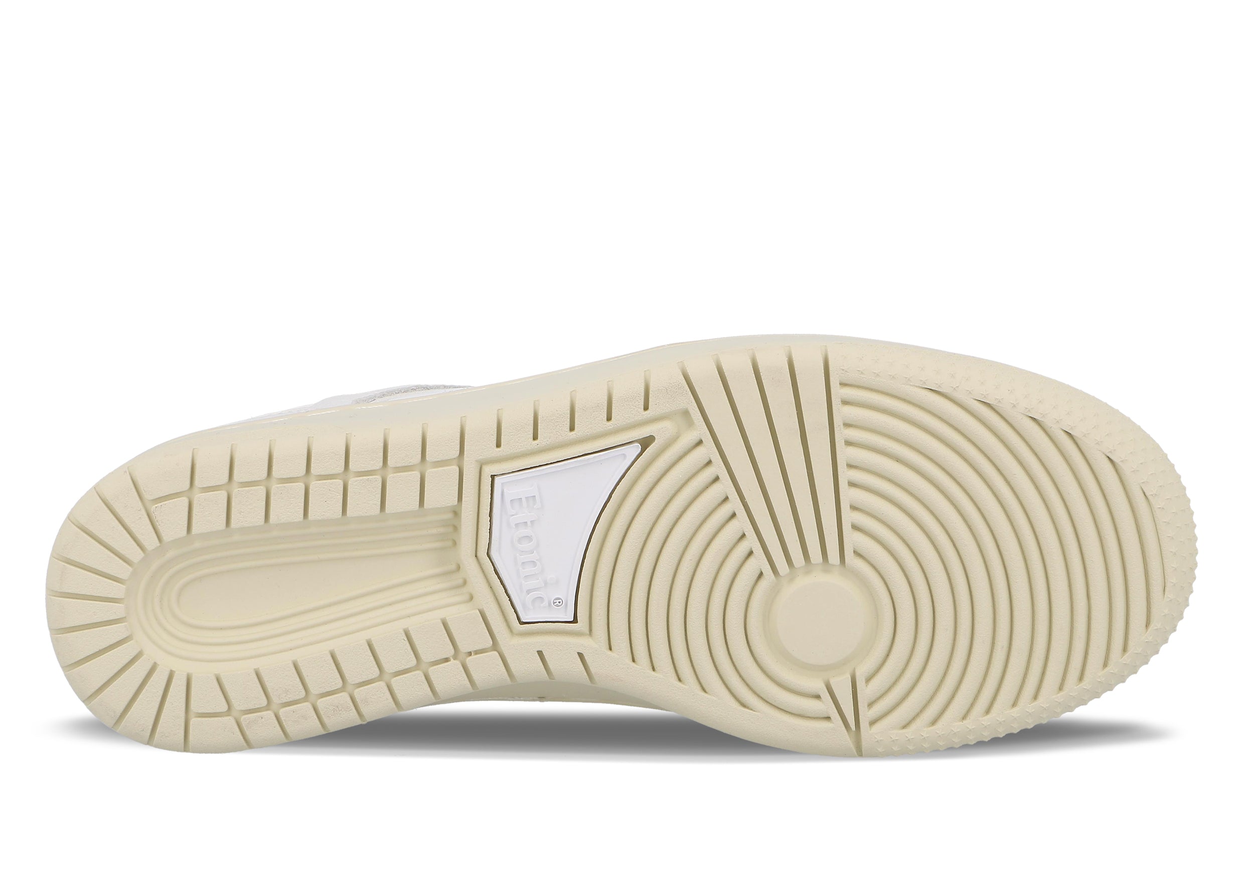 Baskets Etonic B509 en cuir blanc avec détails ton sur ton et semelle extérieure beige.