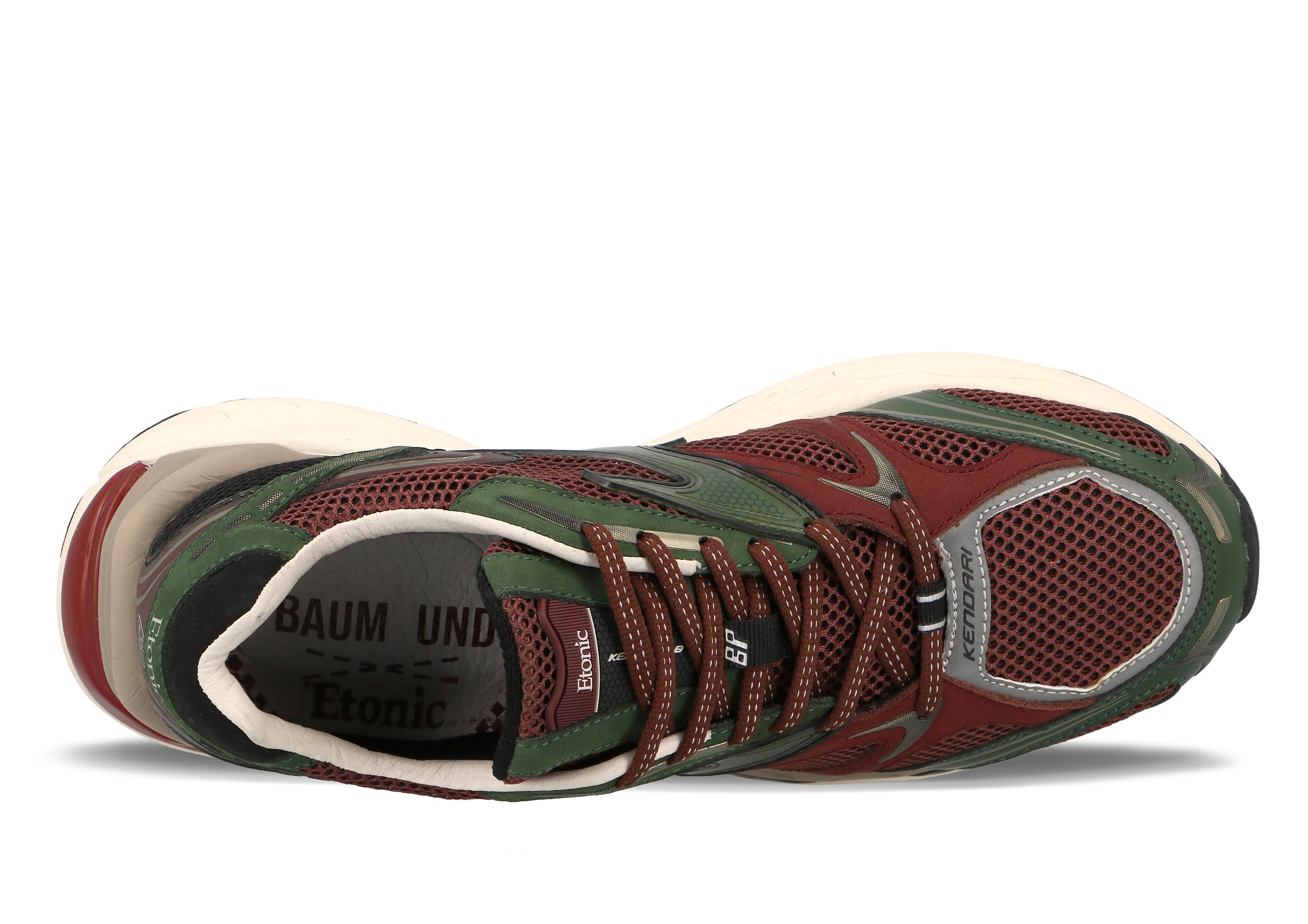 The Limited Edition KENDARI 3.0 sneakers, a collaboration with Baum und Pferdgarten, feature a sporty design in Kombu Rum Green. Made with suede and mesh details, thick rubber soles, and additional brown laces for a unique and performance-driven style.