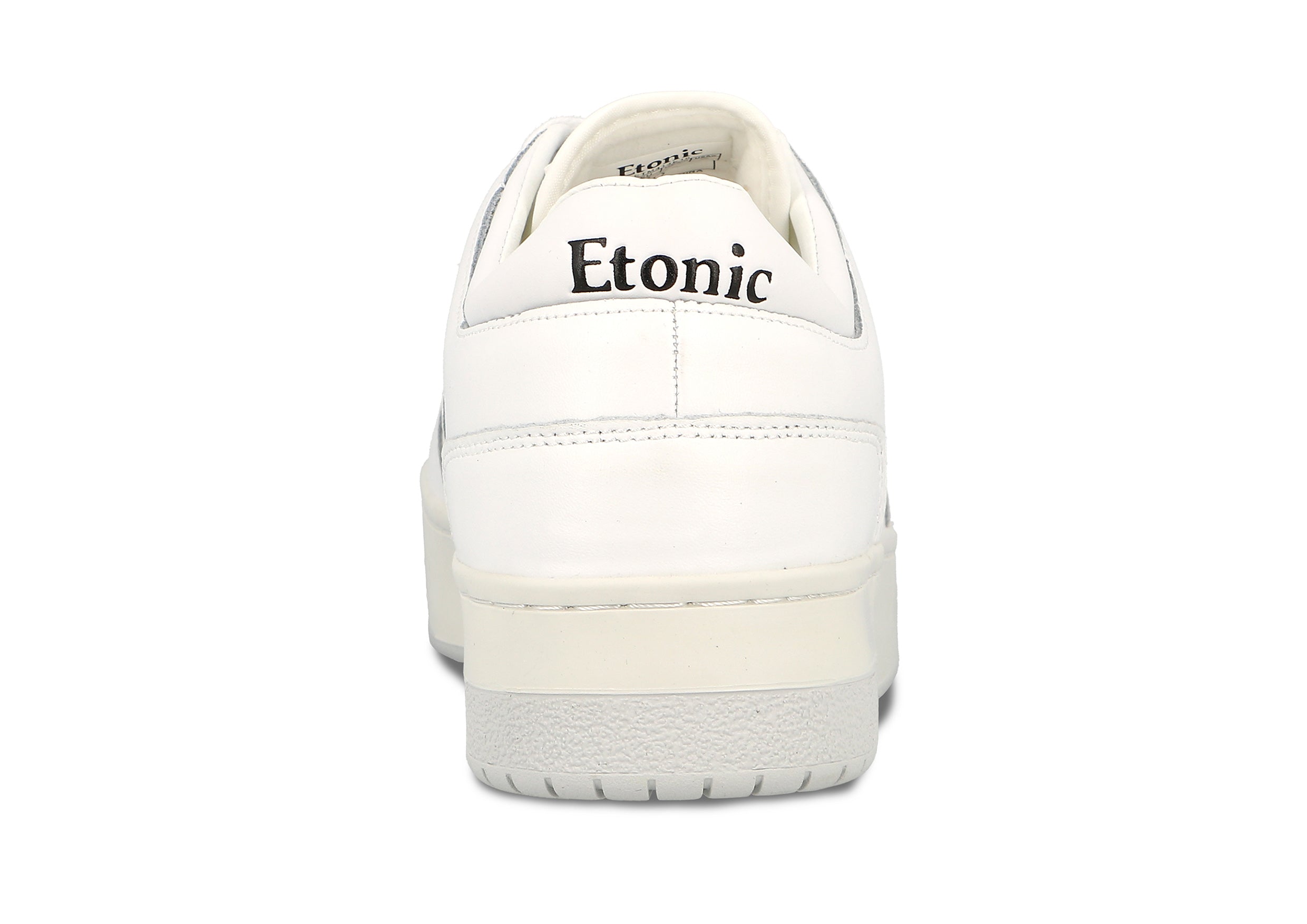 Sneakers Etonic B509 in pelle bianca con dettagli neri e suola bianco sporco.