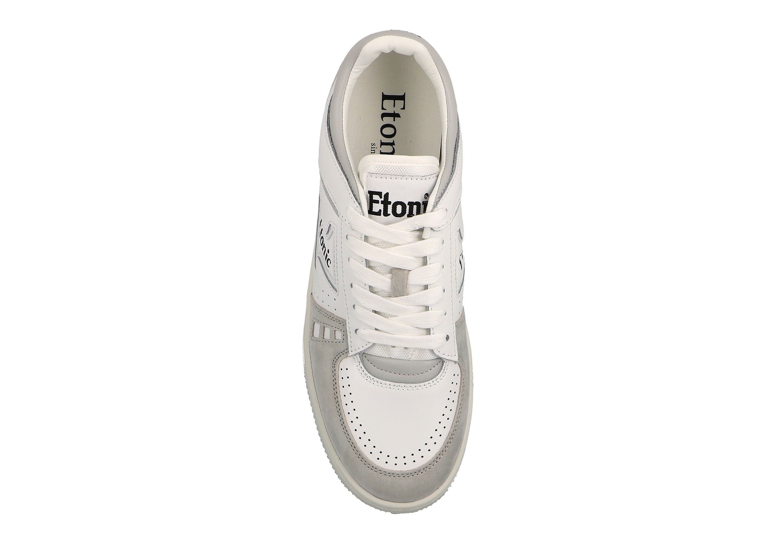 Sneakers Etonic B509 in pelle bianca, camoscio grigio chiaro, dettagli neri e suola bianco sporco.